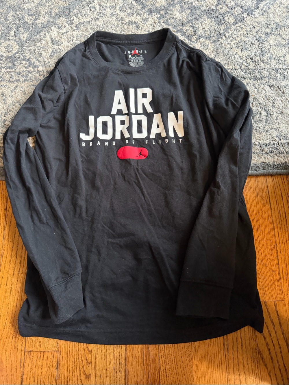 Jordan Black Long Sleeve Air Jordan Logo Tee with Red Accent